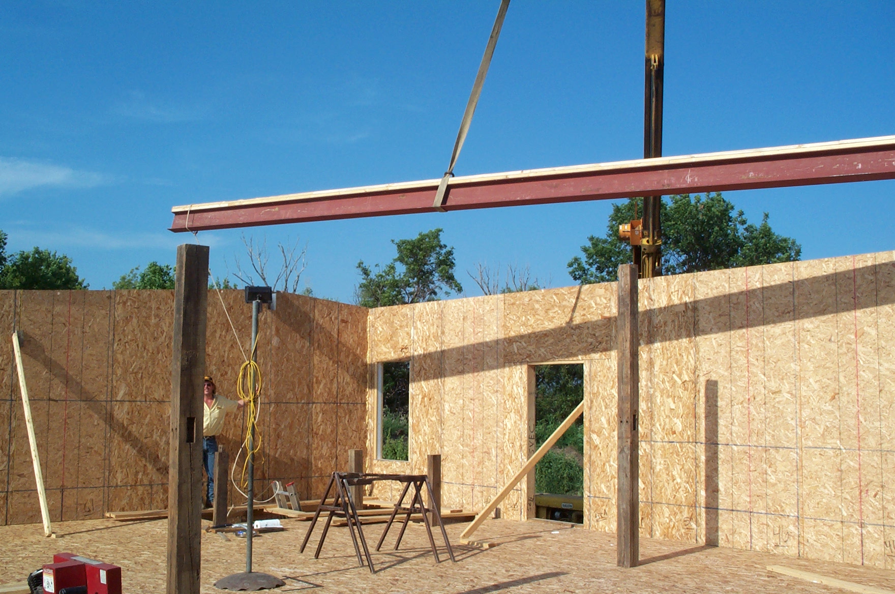 10.-Steel-Beam-Roof-Support-with-old-barn-supports - Dakota Rural Action